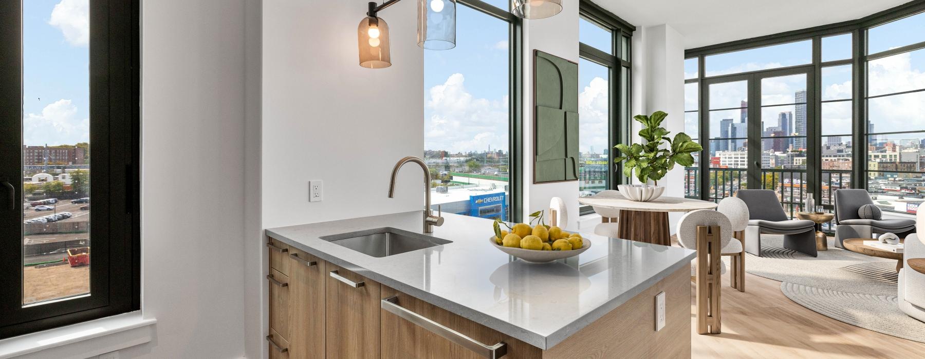 a kitchen counter with a bowl of fruit